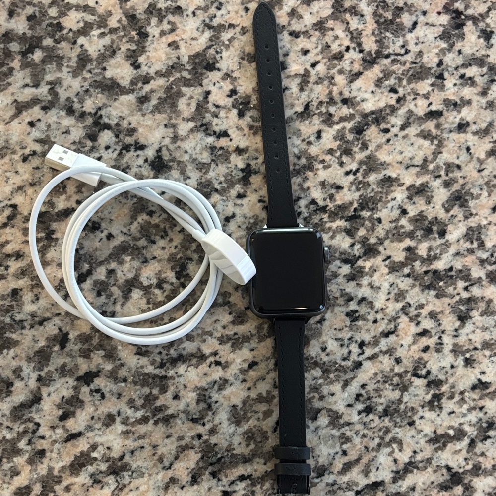 Black Apple Watch SE (GPS) with Charger